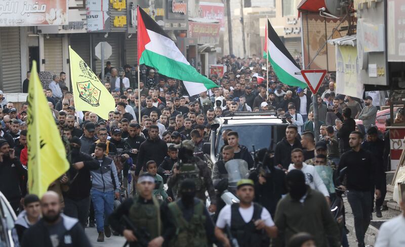 Mourners take part in the funeral procession of a Palestinian teenager killed by Israel in Jenin, the occupied West Bank, last month. EPA