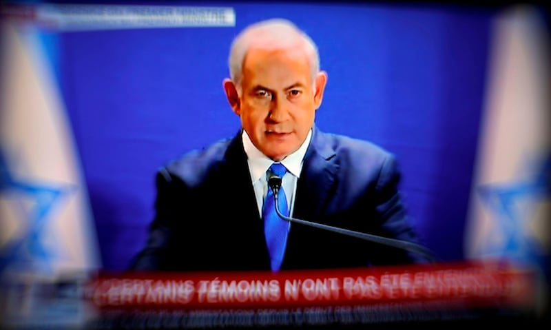 TOPSHOT - This picture taken from I-24 television shows Israeli Prime Minister Benjamin Netanyahu delivering a statement live on I24 TV channel at the Prime Minister's office in Jerusalem on January 07, 2019. / AFP / I24 / Thomas COEX
