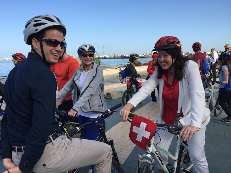 Riders get ready on the Corniche. Christopher Pike / The National