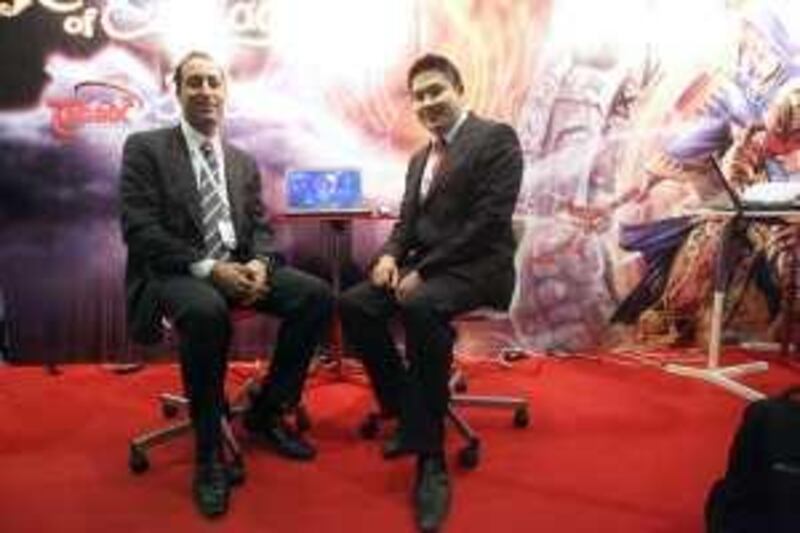 United Arab Emirates - Dubai - October 27th, 2009:  Samih Toukan, left, and Steve Tsao of Al Jabbar Internet Group at the World Gaming Expo at the Dubai International COnvention and Exhibition Centre.  (Galen Clarke/The National) *** Local Caption ***  GC01_10272009_Gamers.jpg