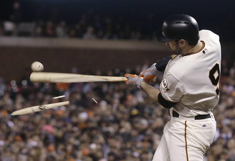 San Francisco Giants’ Brandon Belt breaks his bat while grounding out against the Oakland Athletics in the sixth inning of a baseball game in San Francisco on June 28, 2016. Jeff Chiu / Associated Press