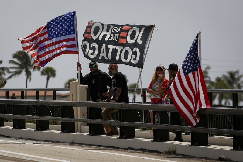 Supporters of Mr Trump demonstrate outside Mar-a-Lago in Palm Beach. Bloomberg