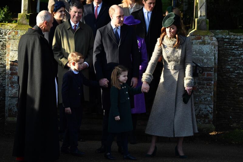 From left: Britain's Prince George of Cambridge, Britain's Prince William, Duke of Cambridge, Britain's Princess Charlotte of Cambridge, and Britain's Catherine, Duchess of Cambridge, leave after the Royal Family's traditional Christmas Day service at St Mary Magdalene Church in Sandringham. AFP