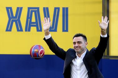 Soccer Football - FC Barcelona unveil new coach Xavi - Camp Nou, Barcelona, Spain - November 8, 2021 FC Barcelona coach Xavi waves to fans during the unveiling REUTERS / Albert Gea     TPX IMAGES OF THE DAY