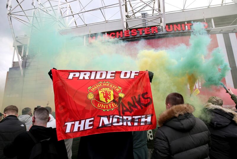 File photo dated 02-05-2021 of A fan holds up a banner as they protest against the Glazer family, owners of Manchester United. Issue date: Tuesday May 4, 2021. PA Photo. Manchester United fans should expect a stubborn response from the club’s American owners to their recent protests, an analyst has warned. See PA story SOCCER Man Utd. Photo credit should read Barrington Coombs/PA Wire.