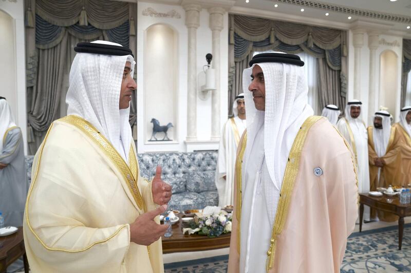 ABU DHABI, UNITED ARAB EMIRATES - August 21, 2018: HH Sheikh Hazza bin Zayed Al Nahyan, Vice Chairman of the Abu Dhabi Executive Council (L) and HH Lt General Sheikh Saif bin Zayed Al Nahyan, UAE Deputy Prime Minister and Minister of Interior (R) attend an Eid Al Adha reception at Mushrif Palace.

( Mohamed Al Hammadi / Crown Prince Court - Abu Dhabi )
---