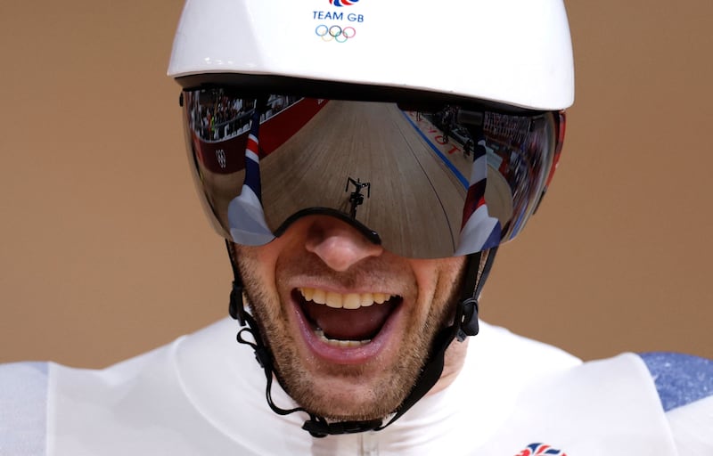 Britain's Jason Kenny celebrates taking gold.