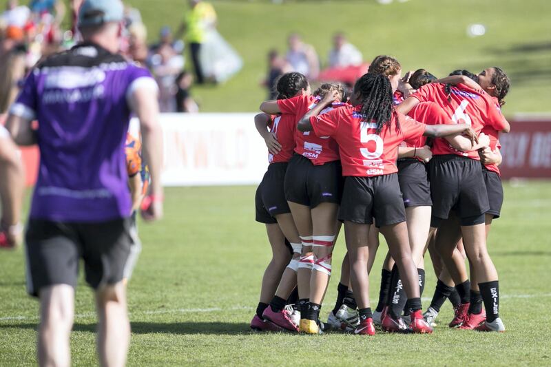 DUBAI, UNITED ARAB EMIRATES - DECEMBER 1, 2018. 

DUBAI EXILES, red, win in the Gulf Under 19 games, against ARABIAN KNIGHTS on the final day of this year's Dubai Rugby Sevens.

(Photo by Reem Mohammed/The National)

Reporter: 
Section:  NA  SP