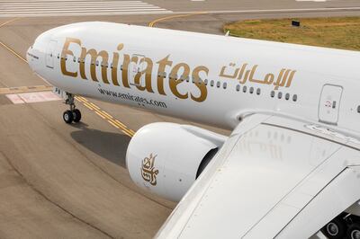 Emirates Boeing 777-300ER photographed on August 17, 2015 from Wolfe Air Aviation's Lear 25B.