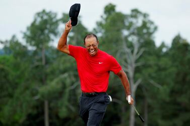 Tiger Woods celebrates on the 18th hole after winning the 2019 Masters. Reuters