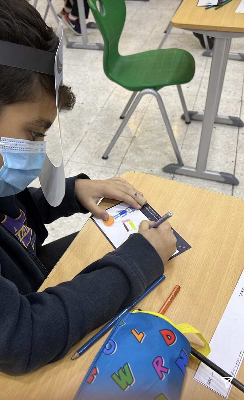 Many pupils featured planets on their postcards, depicting humans landing on Mars, the UAE flag in space and futuristic cars. Photo: Hazza Al Mansouri Instagram