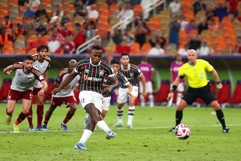 Jhon Arias of Fluminense scores their first goal from the penalty spot. Getty Images