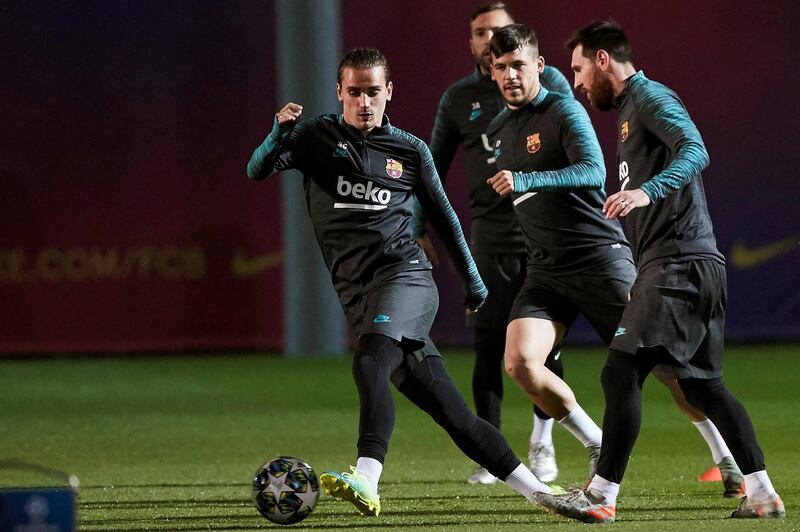 Antoine Griezmann, Carles Perez and Lionel Messi take part in a Barcelona training session. EPA