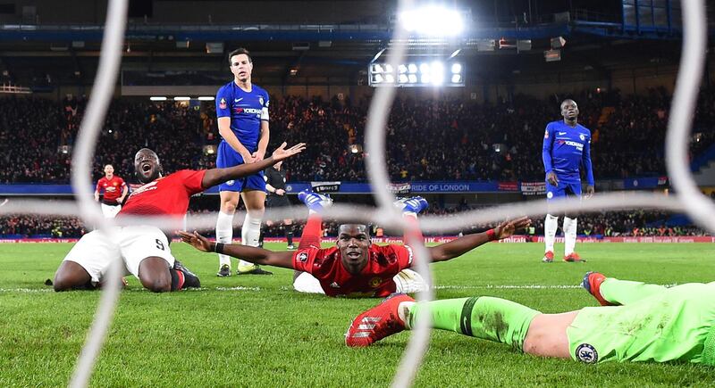 LONDON, ENGLAND - FEBRUARY 18:  Paul Pogba of Manchester United celebrates with Romelu Lukaku as he scores his team's second goal during the FA Cup Fifth Round match between Chelsea and Manchester United at Stamford Bridge on February 18, 2019 in London, United Kingdom. (Photo by Michael Regan/Getty Images)