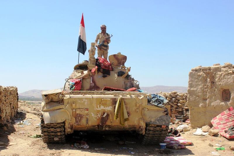 A Yemeni soldier stands on a tank stationed near Marib's old city on October 16, 2015. Angus McDowall/Reuters