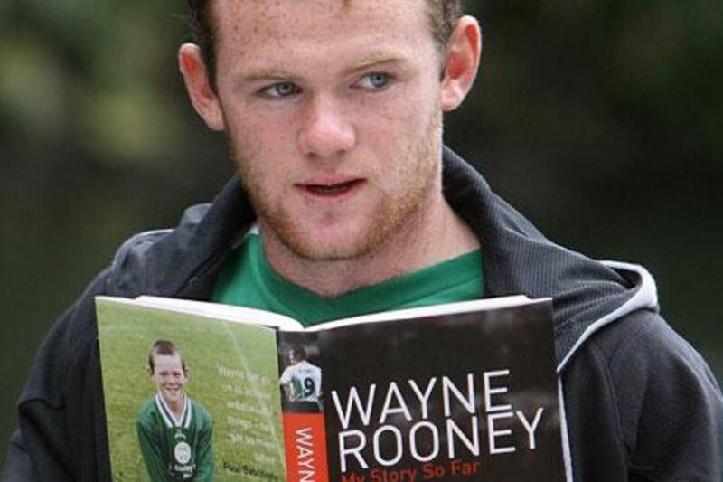 The Manchester United and England footballer Wayne Rooney with his autobiography, which was published in 2006 when he was barely out of his teens.