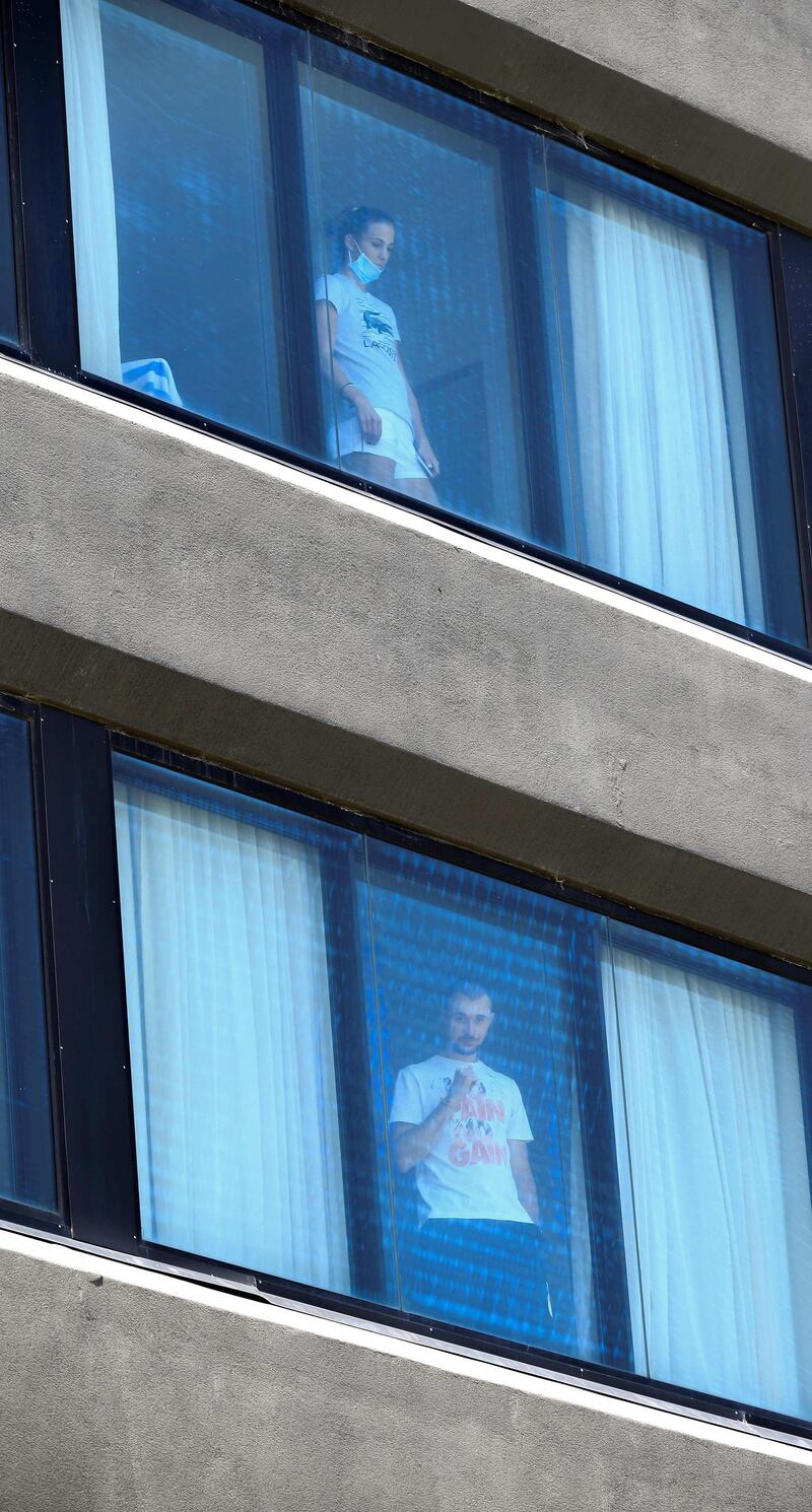 Tennis players wait to leave the hotel for a training session in Melbourne. AFP