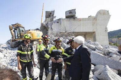 epa06955583 A handout photo made available by the Quirinal Press Office shows Italian President Sergio Mattarella (R) during his visit to the site of the highway-bridge-collapse disaster, before attending the State funeral of the victims, in Genoa, Italy, 18 August 2018. The Morandi bridge partially collapsed on 14 August, killing at least 41 people.  EPA/FRANCESCO AMMENDOLA /QUIRINAL PRESS OFFICE / HANDOUT  HANDOUT EDITORIAL USE ONLY/NO SALES