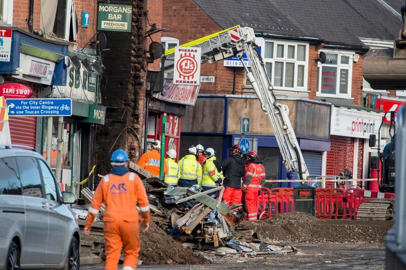 epa06566821 Members of the emergency services at the scene of an explosion at Hinckley Road  Leicester, East Midlands, Britain, 26 February 2018. It has been reported five people were killed and five others were injured after an explosion destroyed a three-storey building in are residential street Leicester.  EPA/WILL OLIVER