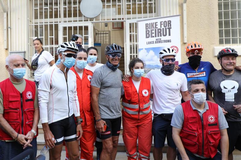 Lance Armstrong with members of the Red Cross. Courtesy Fares Sokhn