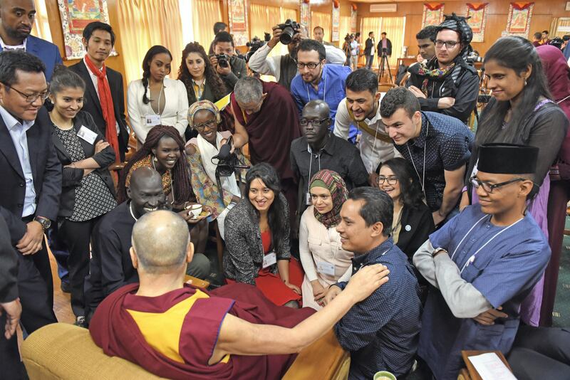 Youth peace builder leaders from conflict areas meet with the Dalai Lama. William Fitz-Patrick / US Institute of Peace.
