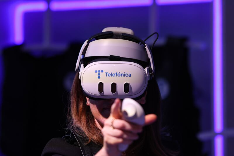 A virtual reality headset is tested on the opening day of the Mobile World Congress in Barcelona. Bloomberg