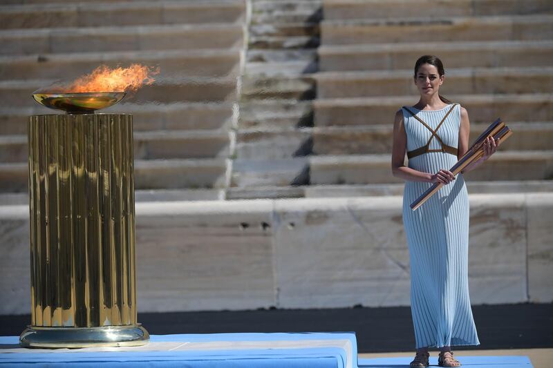 Greek actress Xanthi Georgiou, dressed as an ancient Greek high priestess, during the flame handover ceremony in Athens for the 2020 Tokyo Olympics. AP