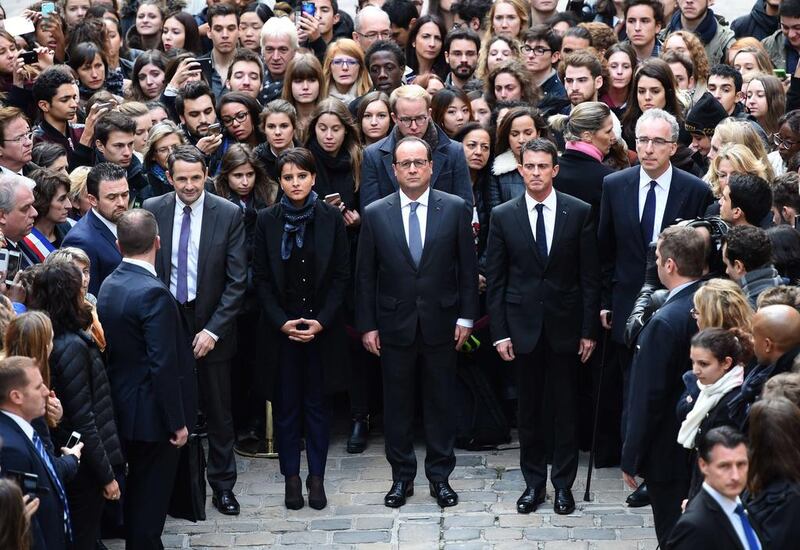 From left: French minister for higher education and research Thierry Mandon; French education minister Najat Vallaud-Belkacem; French president Francois Hollande and French prime minister Manuel Valls observe a minute of silence on November 16, 2015, at the Sorbonne University in Paris in tribute to victims of the attacks claimed by ISIL which killed at least 129 people and left more than 350 injured on November 13. Stephane De Sakutin / Agence France-Presse