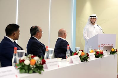 Mohamed Al Askar, director general of the Abu Dhabi Digital Authority, delivering a keynote at the inauguration of Oracle's new innovation hub in Abu Dhabi on Wednesday. Chris Whiteoak / The National