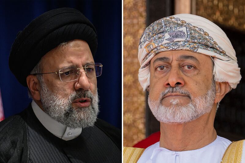 Iranian President Ebrahim Raisi and Oman's Sultan Haitham. AFP/ WAM