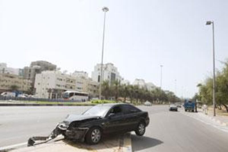 A damaged car at Muroor Road and 15th Street in Abu Dhabi. Fatalities and severe injuries on the capital's roads have declined this year.