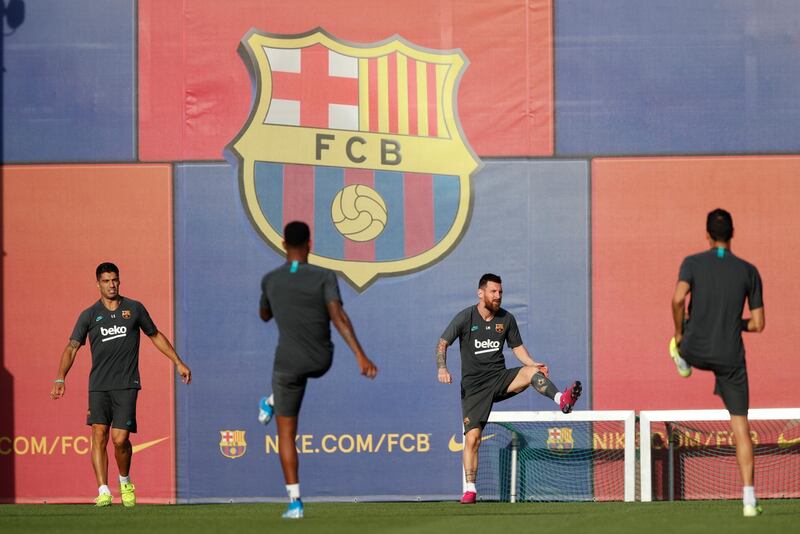 Barcelona players stretching. Reuters