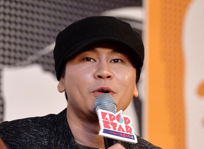 In this Nov. 17, 2014, photo, YG Entertainment chief producer Yang Hyun Suk speaks during a press conference in Seoul, South Korea. Yang stepped down on Friday, June 14, 2019, amid accusations that he tried to cover up alleged drug use by one of the company's artists. (Park Moon-ho/Newsis via AP)