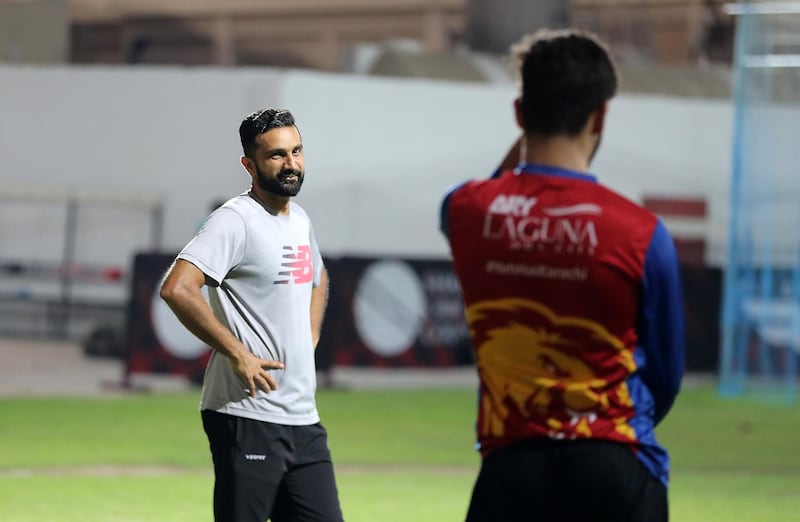 Left to Right- Coach Kashif Daud and Hassan Khan, the son of Afghanistan/IPL star Mohammed Nabi, during the training at Sharjah Cricket Academy in Sharjah on May 10,2021. Pawan Singh / The National. Story by Paul