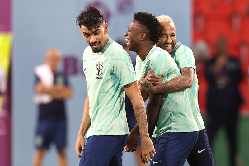 Neymar jokes with teammates Vinicius Junior and Lucas Paqueta. Getty