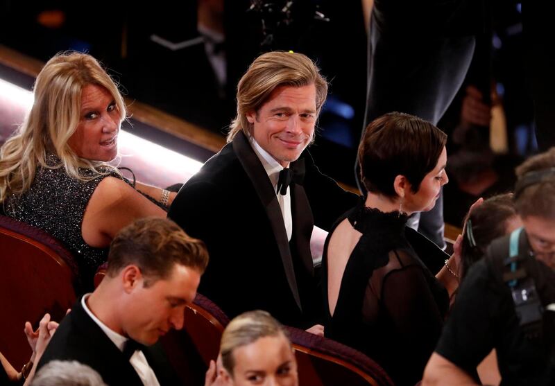 Brad Pitt watches as Anthony Ramos speaks during the Oscars show at the 92nd Academy Awards in Hollywood. Reuters