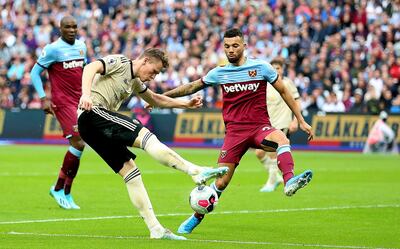 Manchester United's Scott McTominay has a shot on goal during the Premier League match at London Stadium. PA Photo. Picture date: Sunday September 22, 2019. See PA story SOCCER West Ham. Photo credit should read: Nigel French/PA Wire. RESTRICTIONS: EDITORIAL USE ONLY No use with unauthorised audio, video, data, fixture lists, club/league logos or "live" services. Online in-match use limited to 120 images, no video emulation. No use in betting, games or single club/league/player publications.
