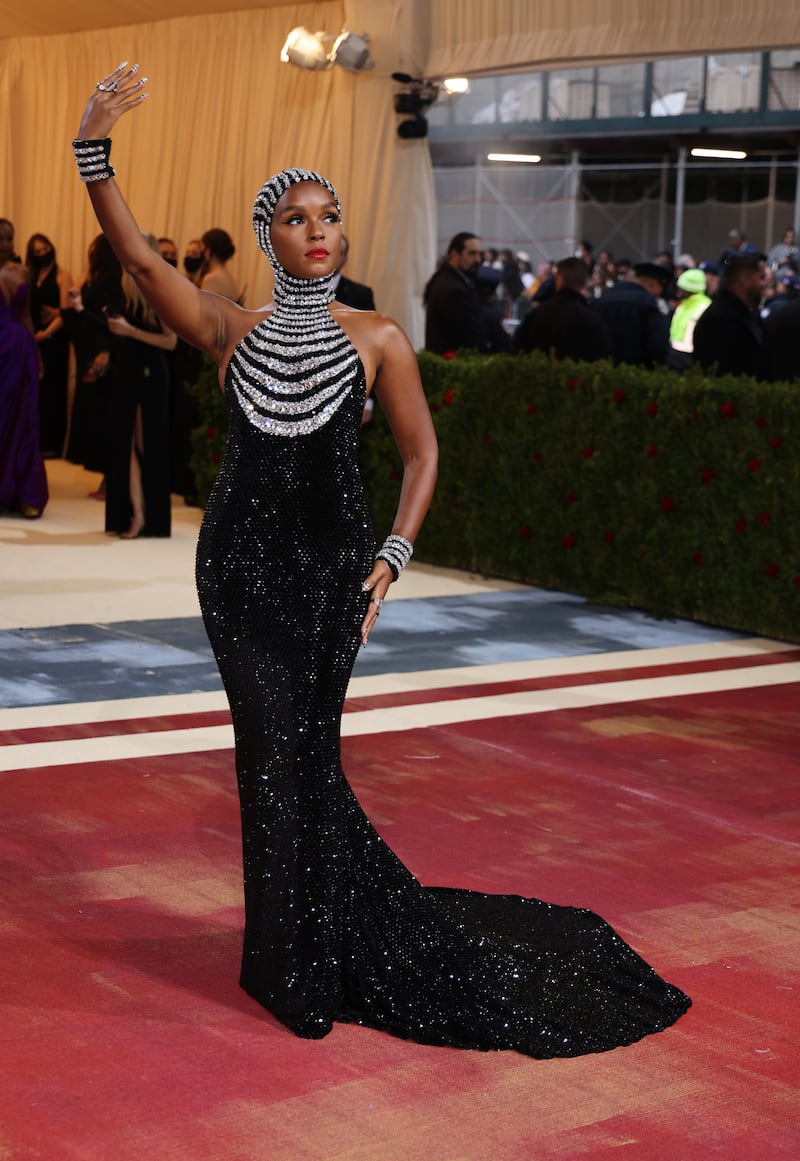 Janelle Monae, wearing a hooded rhinestone Ralph Lauren halter dress with a mermaid skirt, on the red carpet for the 2022 Met Gala on May 2, 2022. EPA 