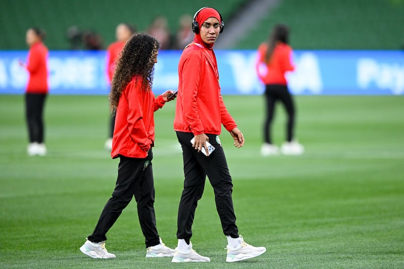 Nouhaila Benzina of Morocco inspects the pitch ahead of the Group H match against Germany. EPA