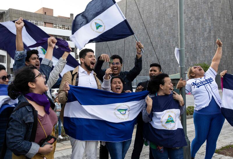 Nicaraguans in exile in Costa Rica celebrate in San Jose, after Nicaragua freed more than 200 political prisoners. AFP