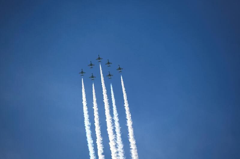 Abu Dhabi, United Arab Emirates - Al Fursan aerobatic demonstration lights up the skyline of Abu Dhabi on December 2, 2018. (Khushnum Bhandari/ The National)
