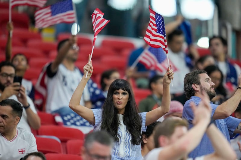 A supporter cheers for Team USA at Al Bayt Stadium in Al Khor, Qatar. AP