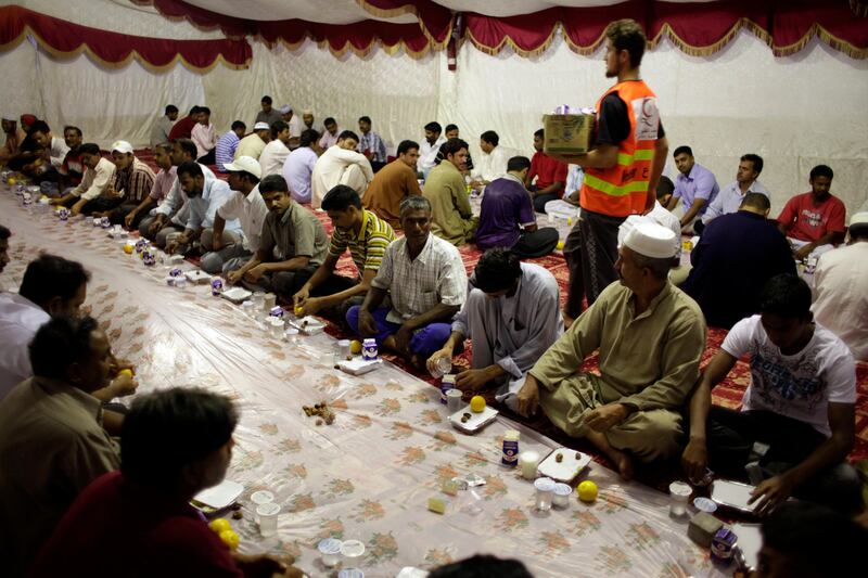 August 15, 2011 (Umm al Quwain) Dozens of people break their daily fast during an Iftar dinner in Umm al Quwain August 15, 2011. (Sammy Dallal / The National)