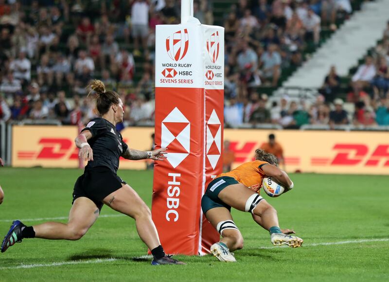 Australia's Demi Hayes scores agains New Zealand.
