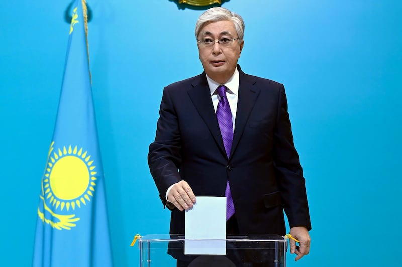 Kazakhstan President Kassym-Jomart Tokayev casts his ballot in Almaty on Sunday. AP