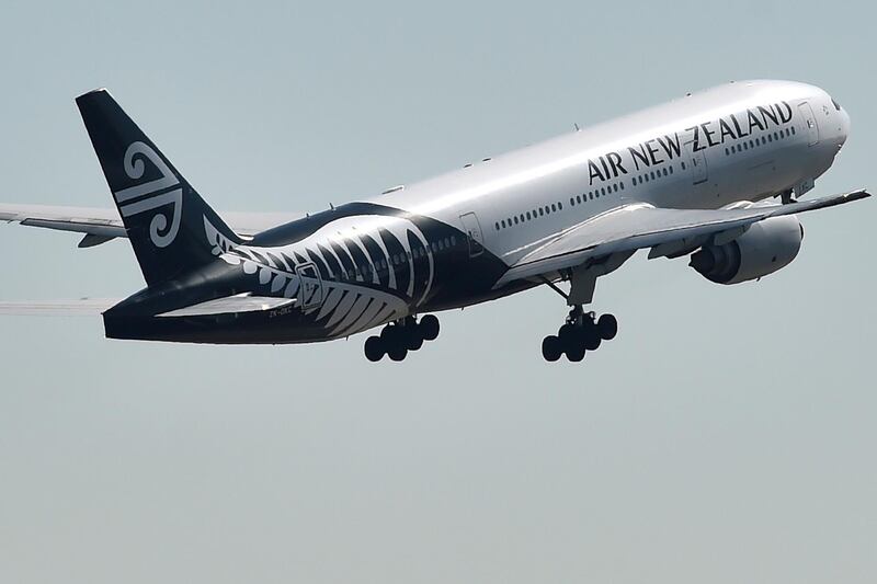 An Air New Zealand plane takes off from the airport in Sydney on August 23, 2017. - Air New Zealand posted a 17.5 percent fall in annual net profit on August 23 as increased competition hit the carrier's bottom line. (Photo by Peter PARKS / AFP)