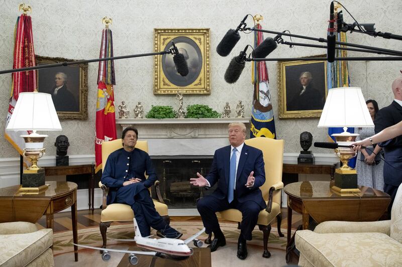 Donald Trump speaks alongside Imran Khan during a meeting in the Oval Office of the White House. Bloomberg