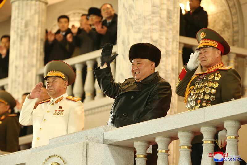 North Korean leader Kim Jong-un salutes troops during a military parade. KCNA / EPA