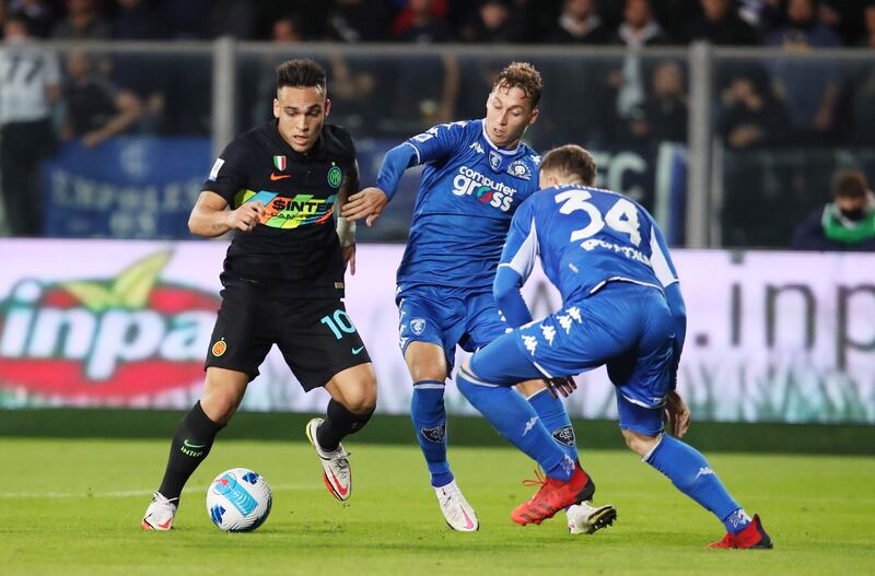 Lautaro Martinez on the ball under pressure from Empoli midfielder Samuele Ricci (C) defender Ardian Ismajli. EPA
