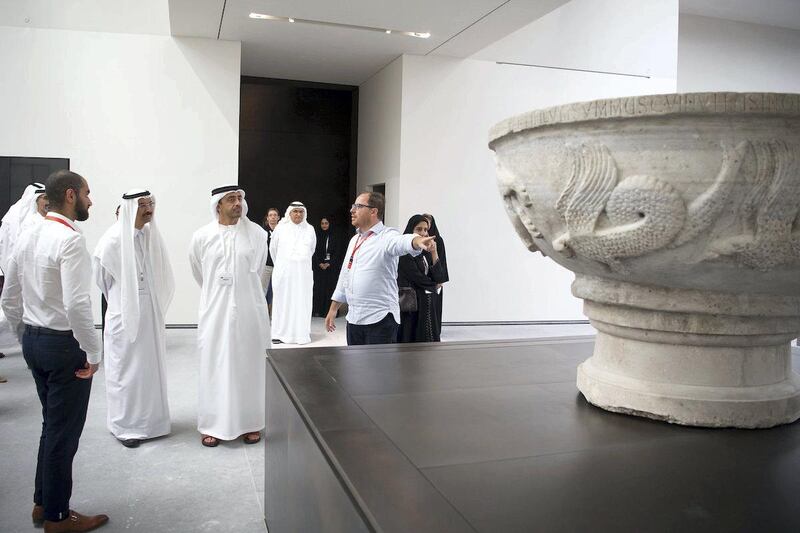 SAADIYAT ISLAND, ABU DHABI, UNITED ARAB EMIRATES -September 11, 2017: HH Sheikh Abdullah bin Zayed Al Nahyan, UAE Minister of Foreign Affairs and International Cooperation (3rd L) and HE Mohamed Al Murr, former Speaker of the UAE Federal National Council (FNC) (2nd L), view the "Bonifilius" basin, during a tour of the Louvre Abu Dhabi. 
( Mohamed Al Raeesi for Crown Prince Court - Abu Dhabi )
---